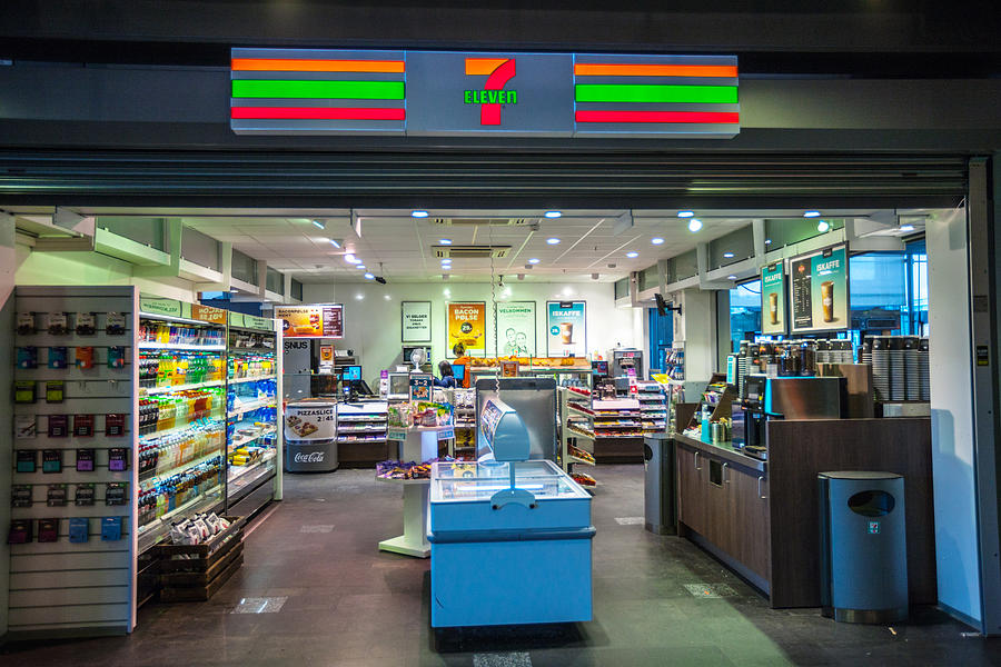 7 Eleven Store at Oslo Train Station, Norway #1 Photograph by Anouchka