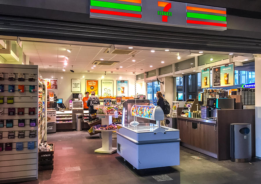 7 Eleven Store inside Oslo Central Train Station, Norway #1 Photograph by Anouchka