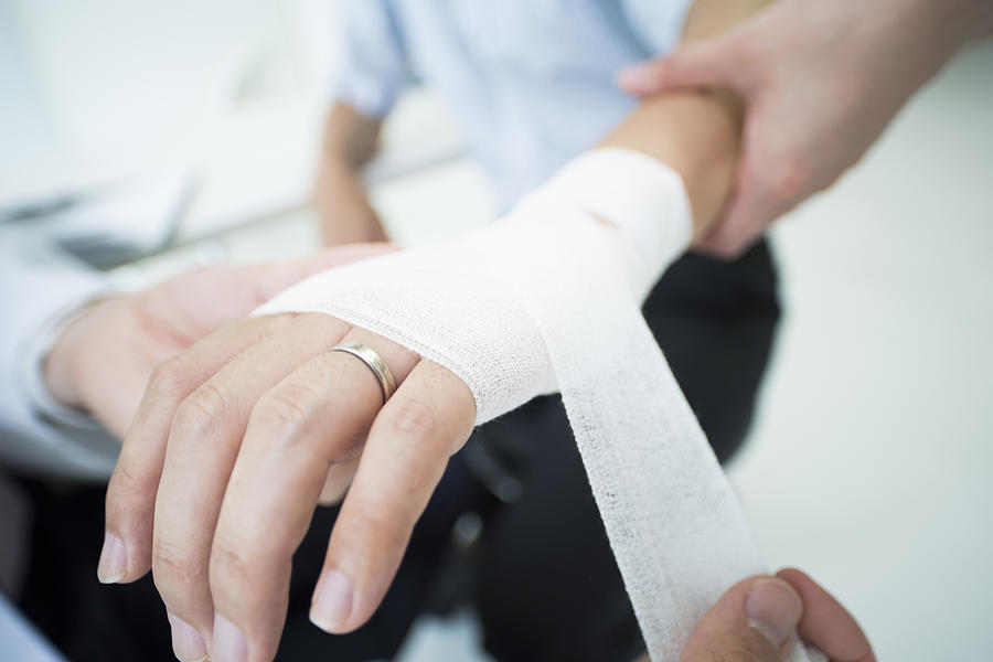 A man who wore a wedding ring got a doctor to receive an allowance for injury. #1 Photograph by Kokouu