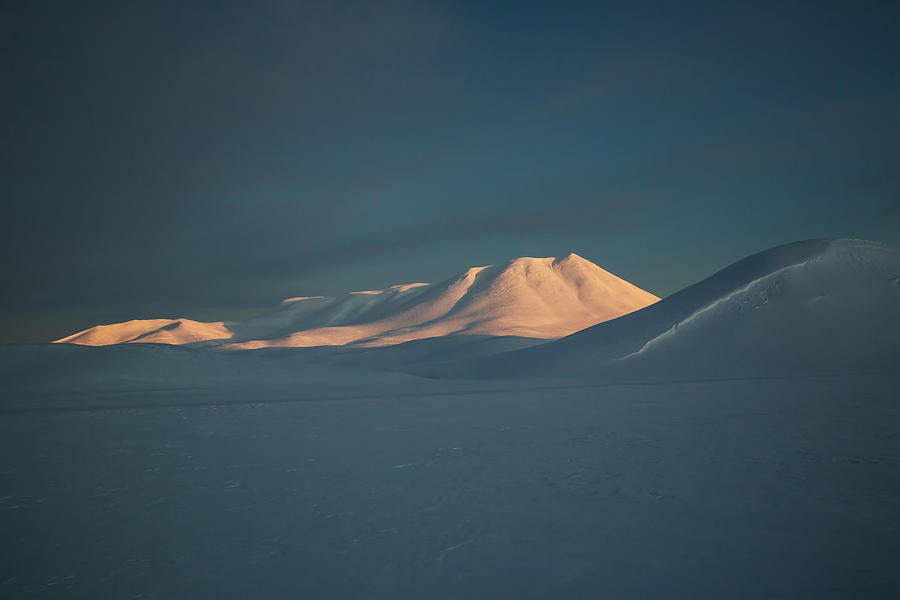 A mountain lit by sunrise. #1 Photograph by Alex Saberi