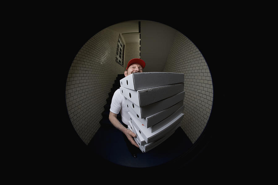 A pizza delivery man, portrait #1 Photograph by Halfdark