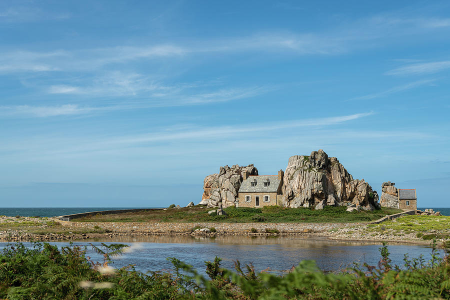 A small stone house built between rocks Photograph by Stefan Rotter