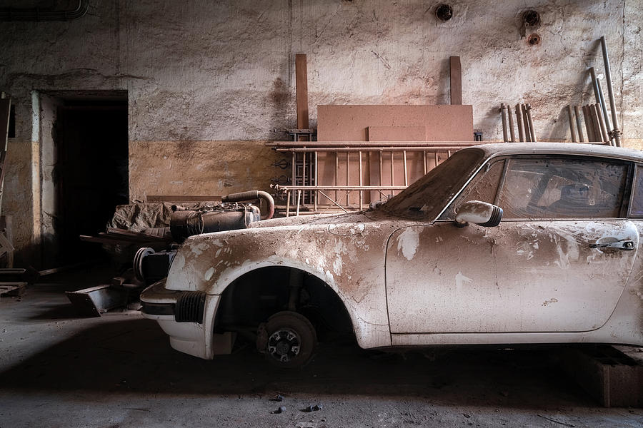 Abandoned Car in Garage #1 Photograph by Roman Robroek