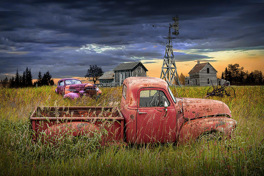 Abandoned Pickup and Auto with Rustic Wooden Barn with Windmill  #1 Photograph by Randall Nyhof