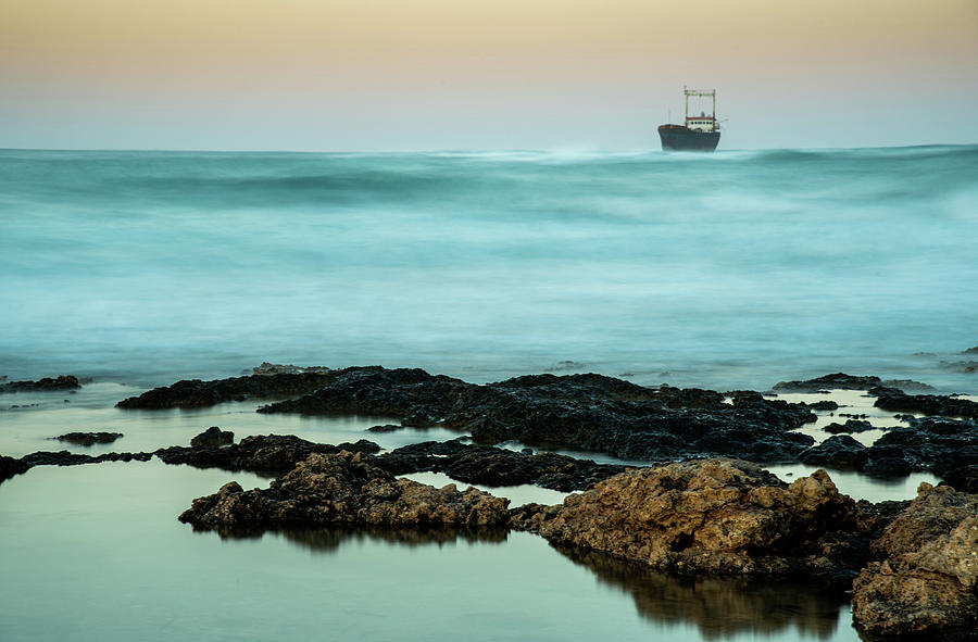 Abandoned ship on the ocean #1 Photograph by Michalakis Ppalis