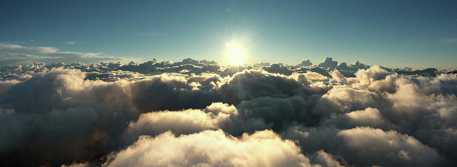 Aerial view of clouds and morning sun #1 Photograph by Mikhail Kokhanchikov