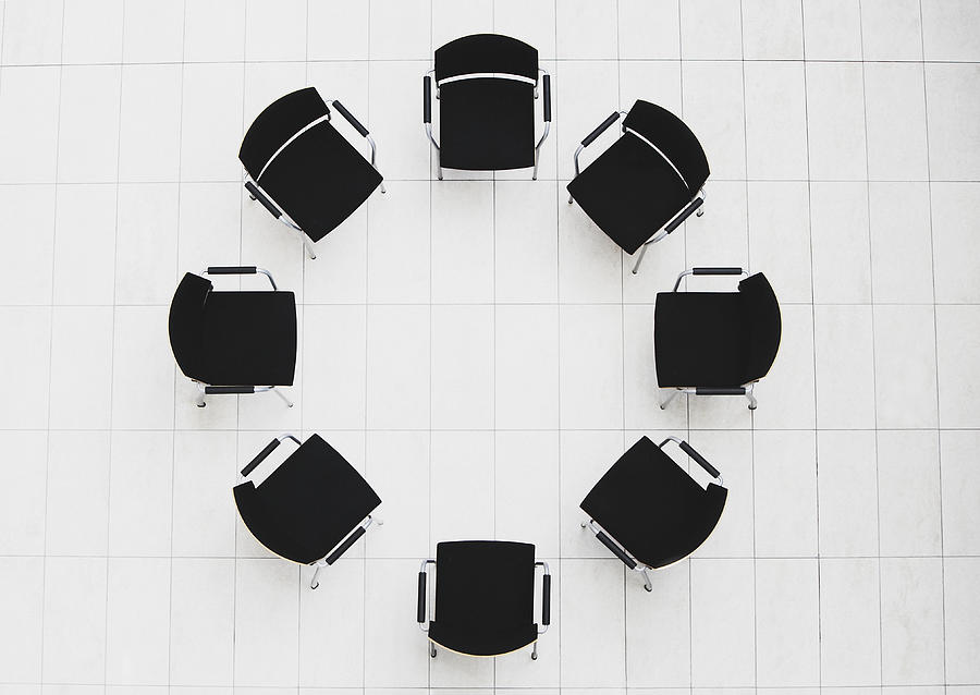 Aerial view of empty chairs in a circle #1 Photograph by Tom Merton