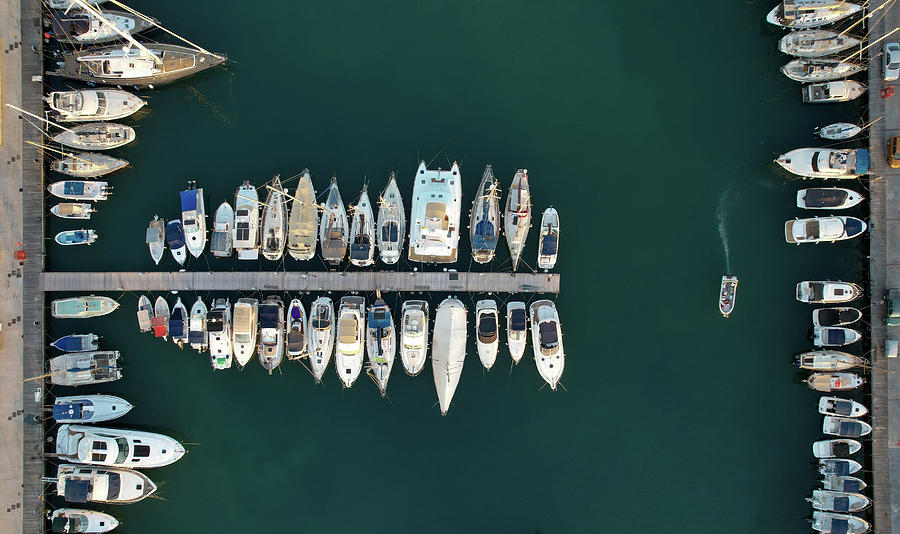 Aerial view of fishing boats and tourist yachts moored at the marina.  #2 Photograph by Michalakis Ppalis