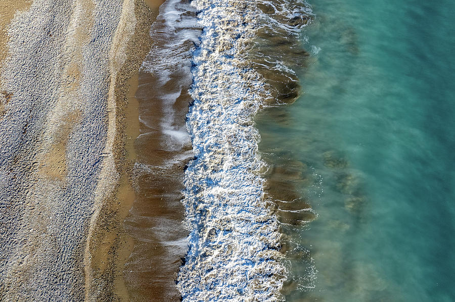 Aerial view of stormy ocean waves breaking on a beach. Nature background #1 Photograph by Michalakis Ppalis