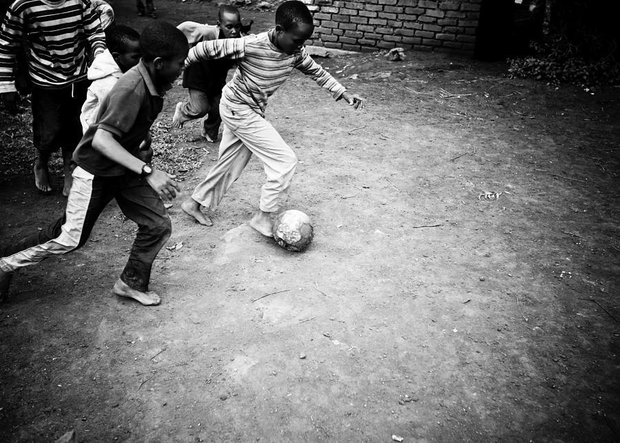 African Boys Playing Soccer #1 Photograph by Ranplett