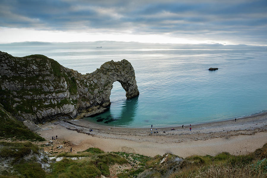 Afternoon cloud breaking up at Durdle Door #1 Photograph by Ian Middleton