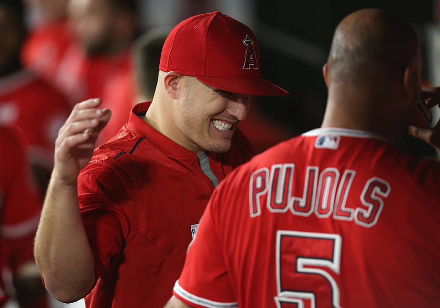 Albert Pujols and Mike Trout #1 Photograph by Stephen Dunn
