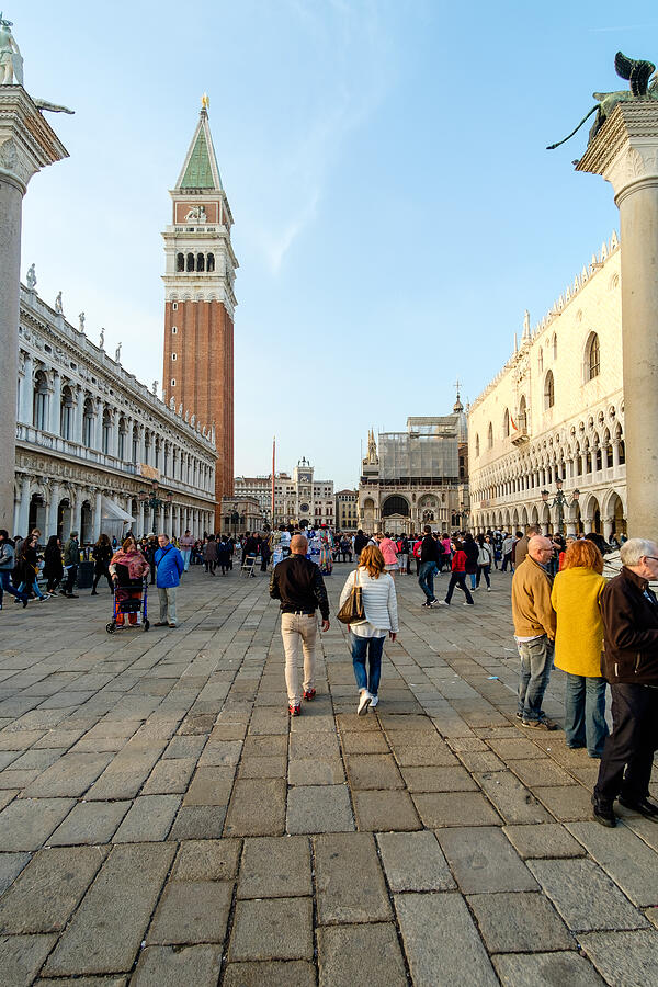 Ancient palace and tourists in Piazza San Marco in Venice #1 Photograph by Cividins