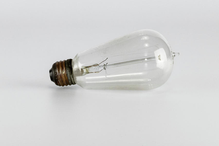 Antique Light Bulb In Porcelain Socket Photograph