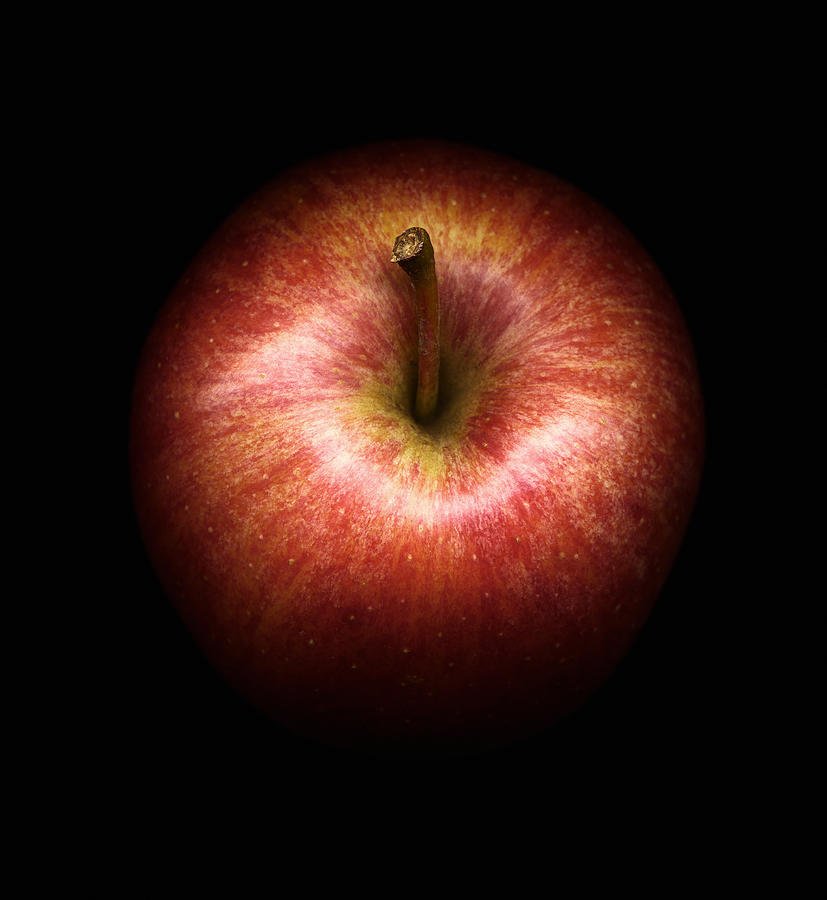 Apple against black background, close-up #1 Photograph by Microzoa Limited