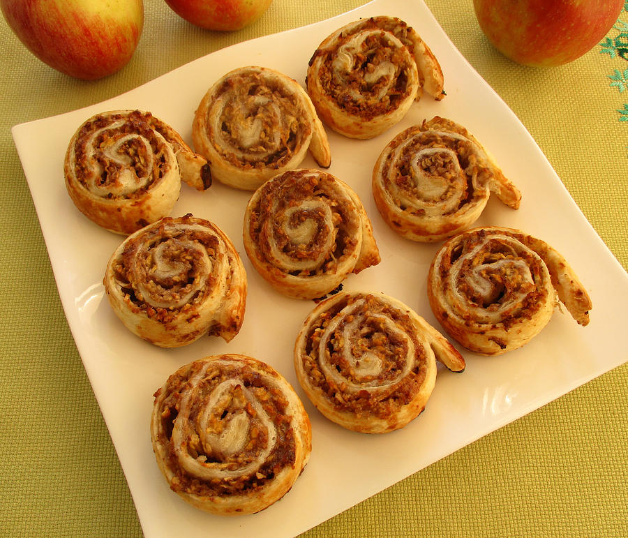 Apple rolls on square plate #1 Photograph by Tanai
