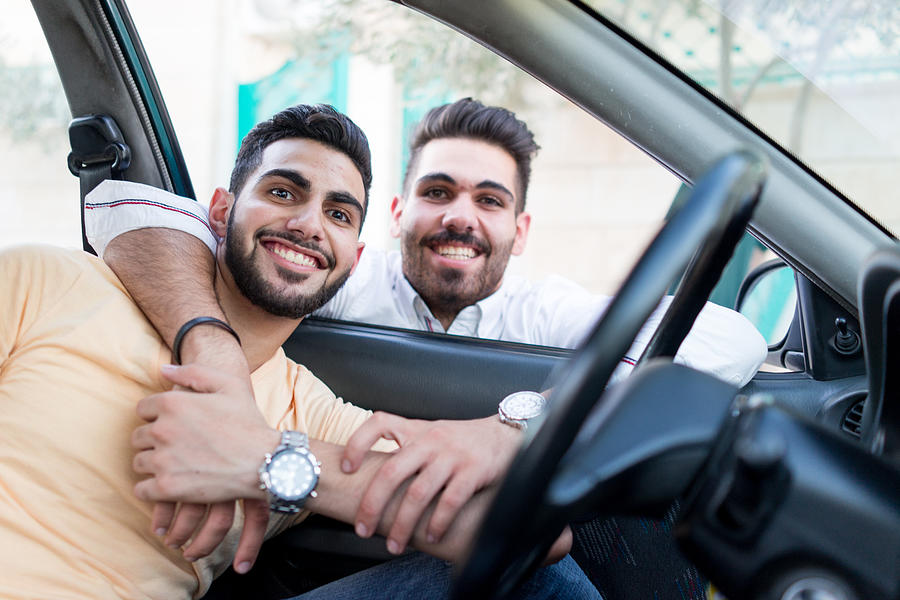 Arabic guy in car #1 Photograph by Jasmin Merdan