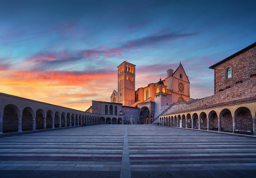 Assisi, San Francesco Basilica church at sunset. Umbria, Italy. Photograph by Stefano Orazzini