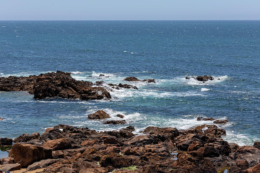 Atlantic ocean with rocks in Matosinhos Photograph by Sebastian Radu