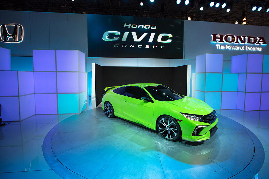 Automakers Showcase New Models At New York International Auto Show Photograph by Kevin Hagen Automakers Showcase New Models At New York International Auto Show Photograph by Kevin Hagen