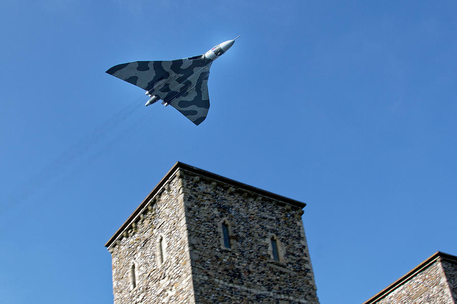 Avro Vulcan Bomber XH558 Last Flight over Reculver towers in Kent UK Photograph by John Gilham