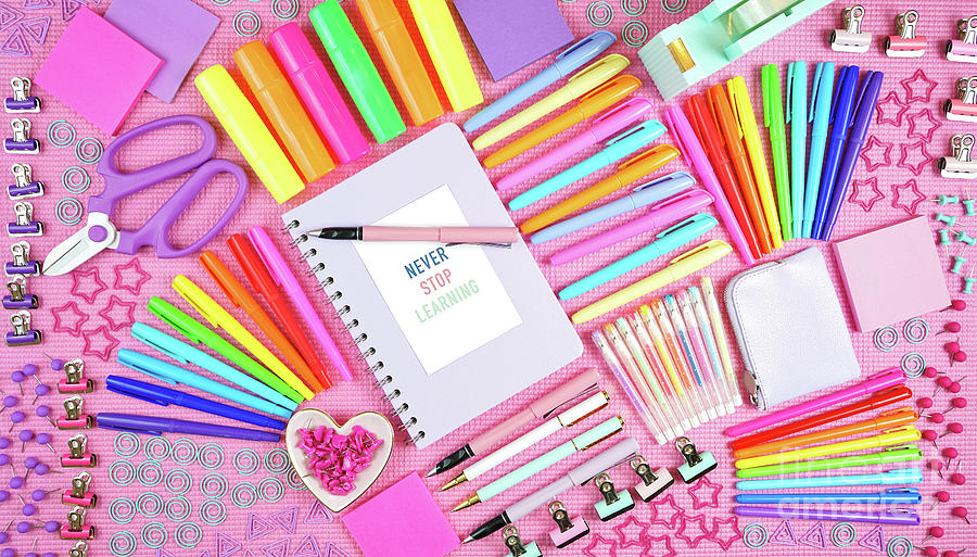 Inspirational Photograph - Back to school or workspace colorful stationery overhead on pink background. #1 by Milleflore Images
