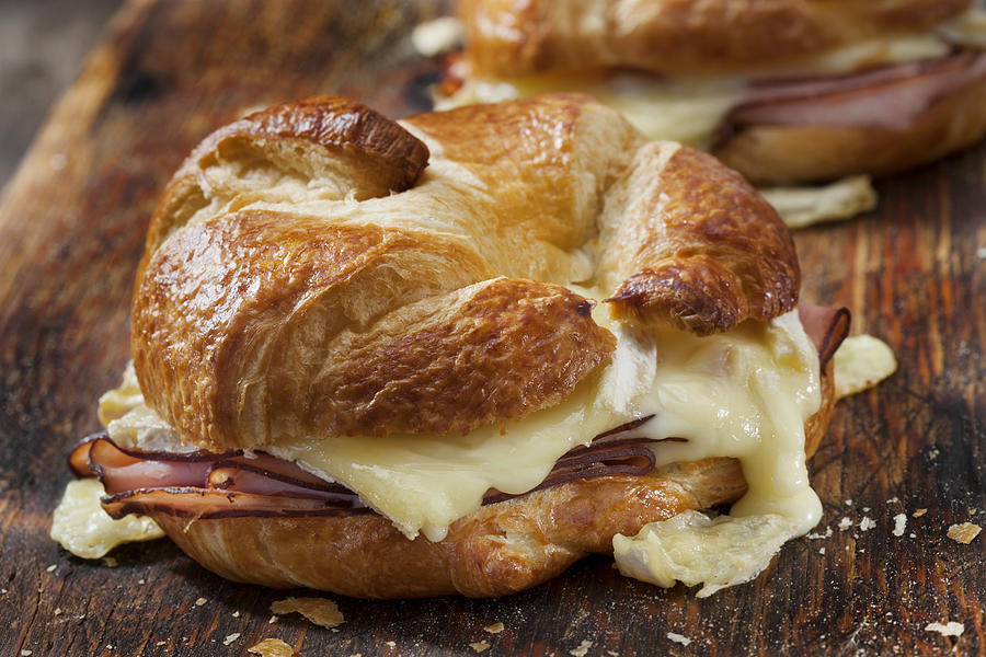 Baked Ham and Brie Croissant Sandwiches with Dijon Mustard #1 Photograph by LauriPatterson