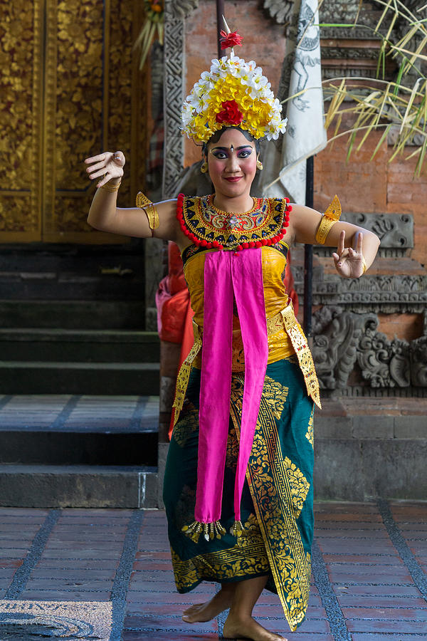 Balinese womans perform a dance-drama took stories from the episodes of Barongan epic. #1 Photograph by Shaifulzamri