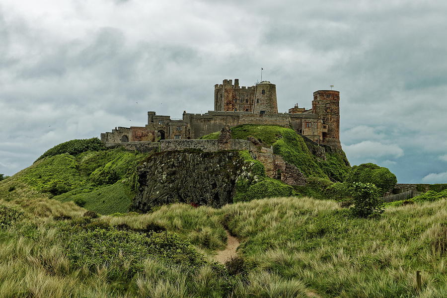 Bamburgh Castle from the Dunes #1 Photograph by Jeff Townsend