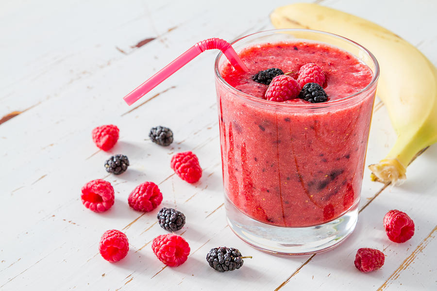 Banana, raspberry and blackberry smoothie,white wood background #1 Photograph by A_namenko