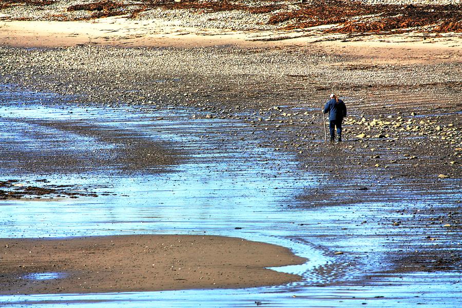 Beach combing #1 Photograph by David Matthews