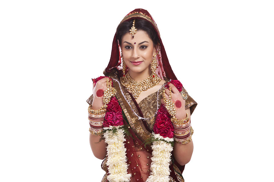 Beautiful bride holding a garland #1 Photograph by Sudipta Halder