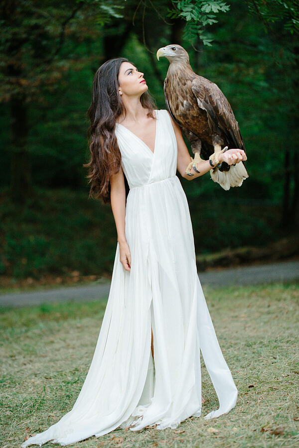 Beautiful girl and her eagle #1 Photograph by CoffeeAndMilk