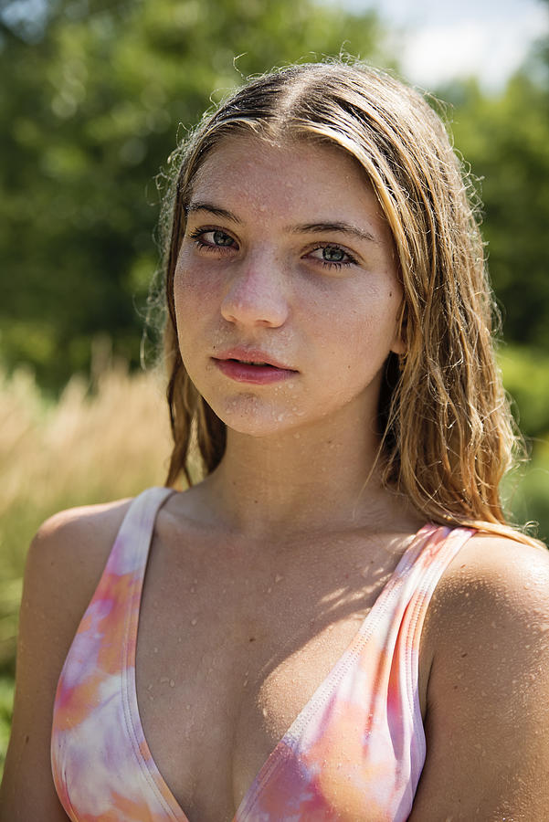 Beautiful portrait of teenage girl in summer nature. #1 Photograph by Martinedoucet