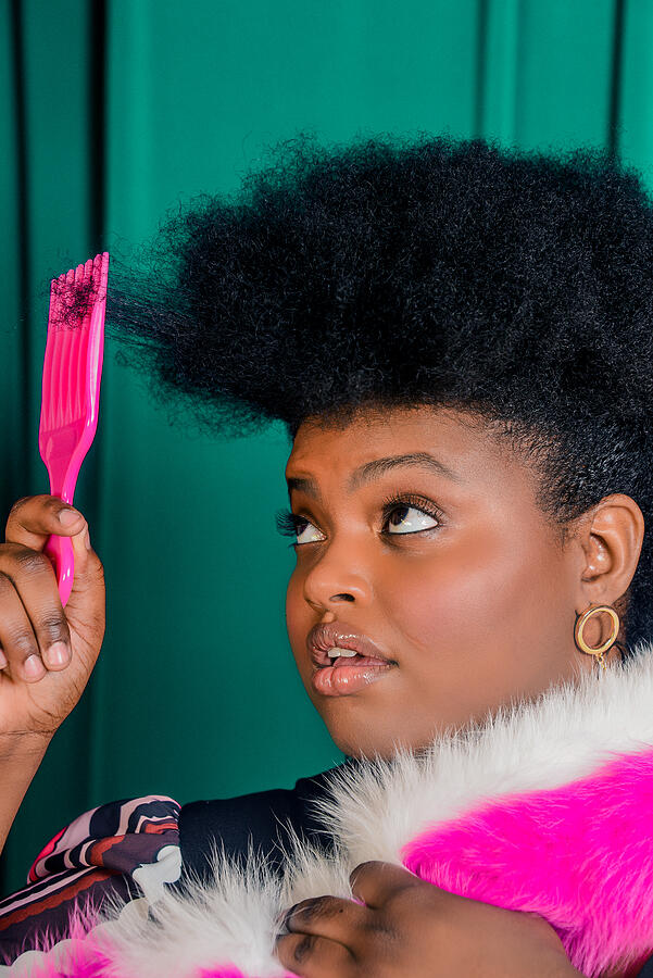 Beauty Portrait of Young Confident Woman with Afro Styling Her Hair with Pick #1 Photograph by Rochelle Brock / Refinery29 for Getty Images