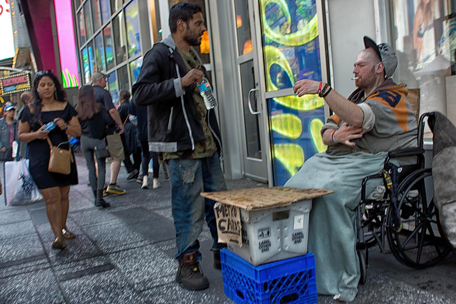 Beggar on the streets of New York #1 Photograph by Alphotographic