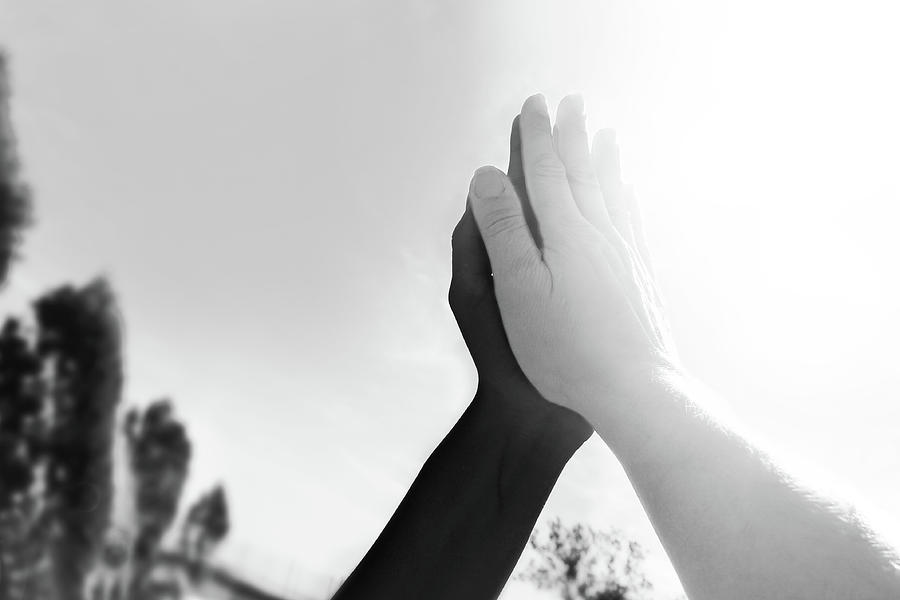 Black and white hands in high-five gesture Photograph by Izabela Anna ...