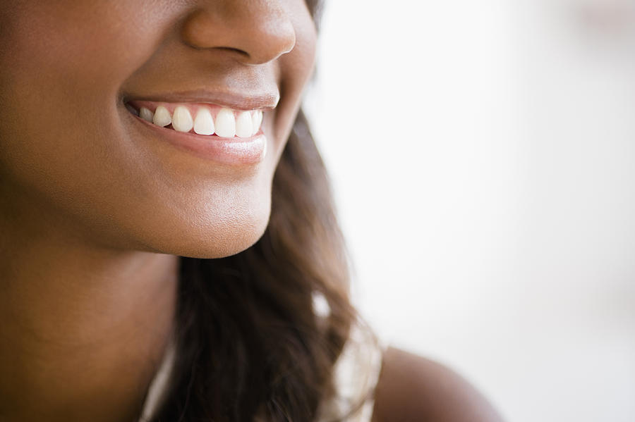 Black woman smiling #1 Photograph by JGI/Jamie Grill