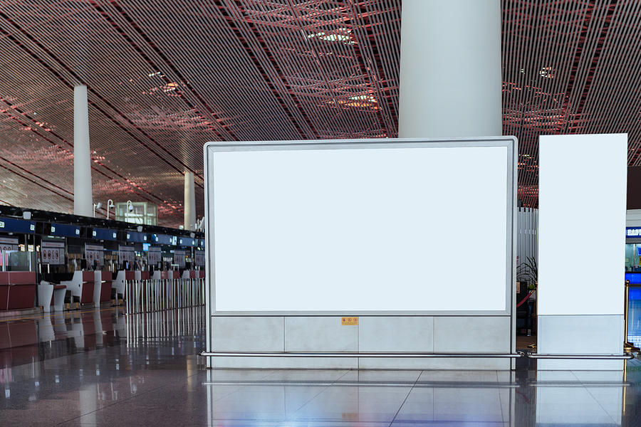 Blank billboard on the corridor of airport #1 Photograph by Wenbin