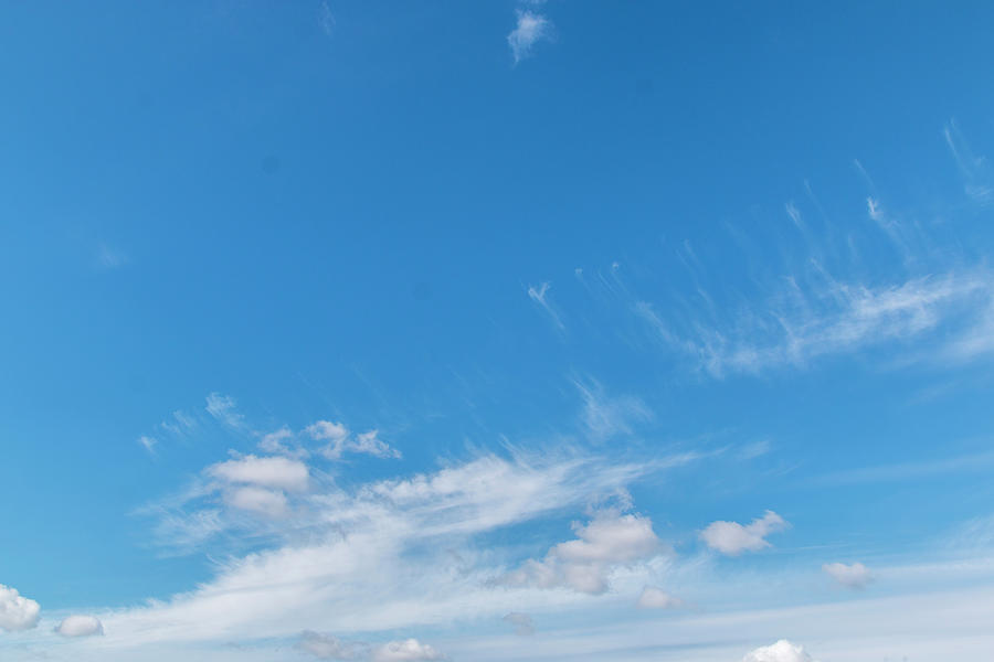 Blue sky with white clouds.on a clear day #1 Photograph by Karlaage Isaksen