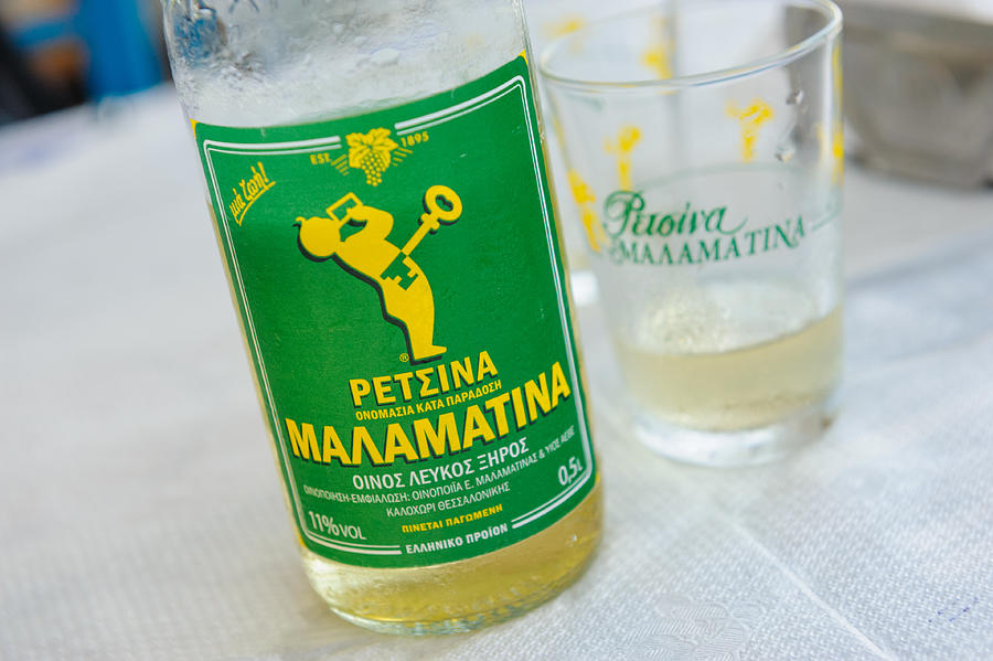 Bottle of Retsina white wine #1 Photograph by Cunfek