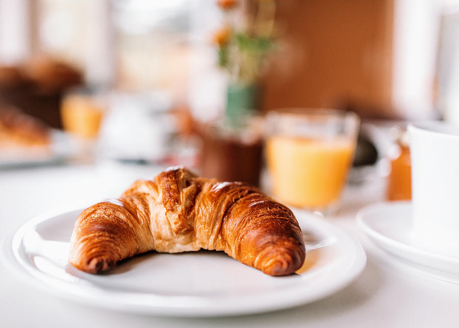 Breakfast - Croissant on table #1 Photograph by Nikada