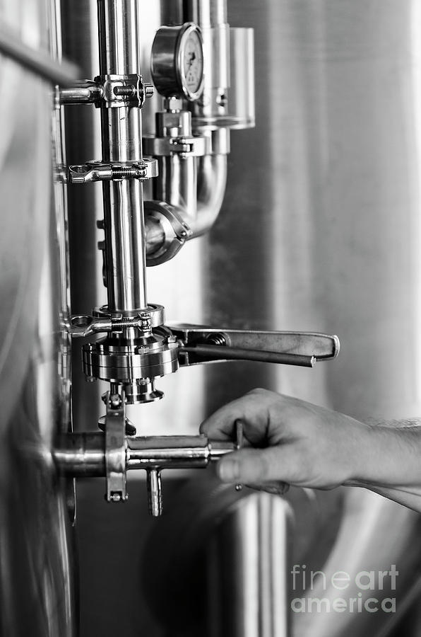 Brewer Operating Industrial Beer Brewing Equipment In Brewery In Photograph