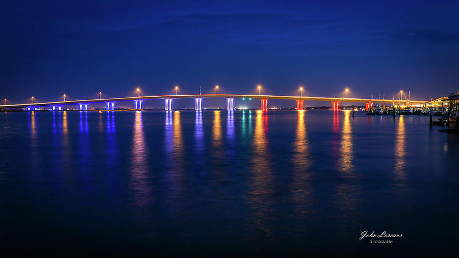 Bridge reflections #1 Photograph by John Loreaux