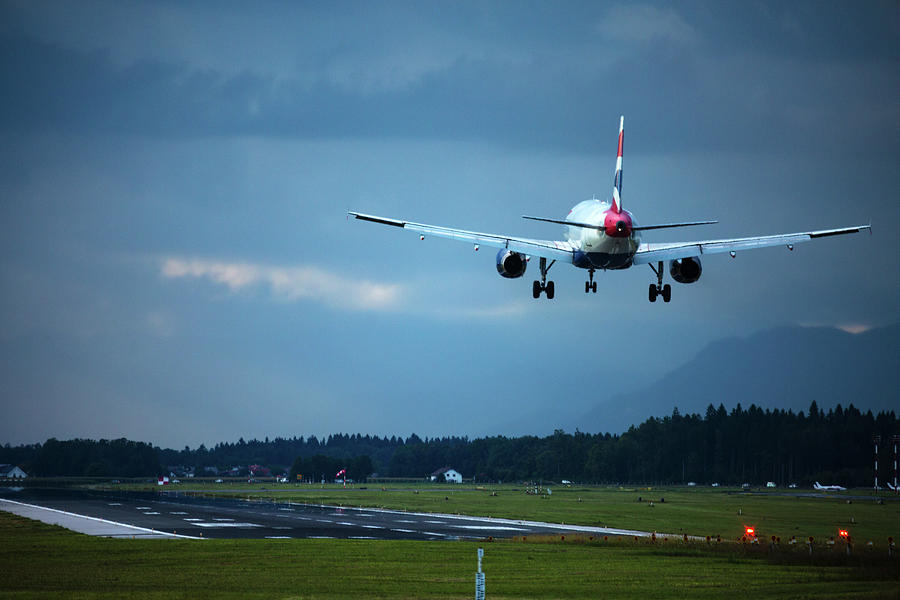 British Airways aircraft landing at Ljubljana Joze Pucnik Airpor #1 Photograph by Ian Middleton