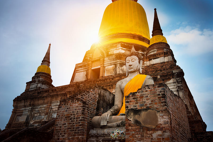 Buddha Temple and monk in Ayuthaya Historical Park, a UNESCO world heritage site in Thailand. #1 Photograph by Chain45154