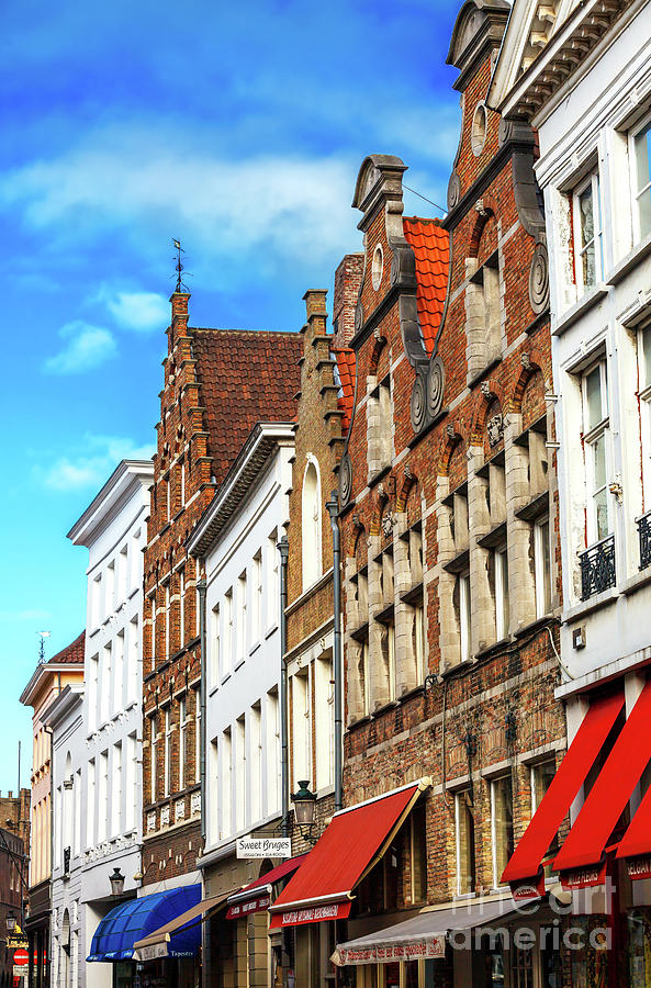 Building Tops in Bruges Belgium #1 Photograph by John Rizzuto