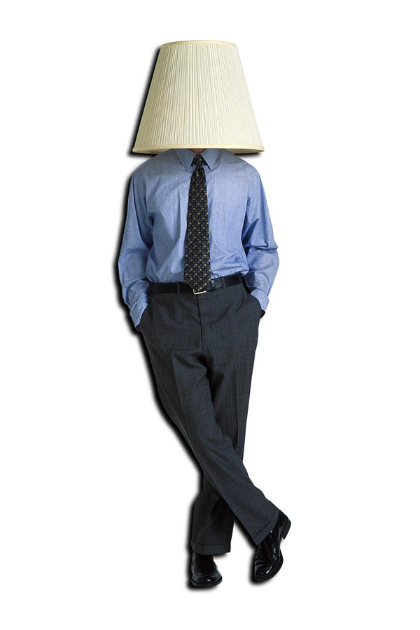 Businessman with lampshade on head #1 Photograph by Jupiterimages