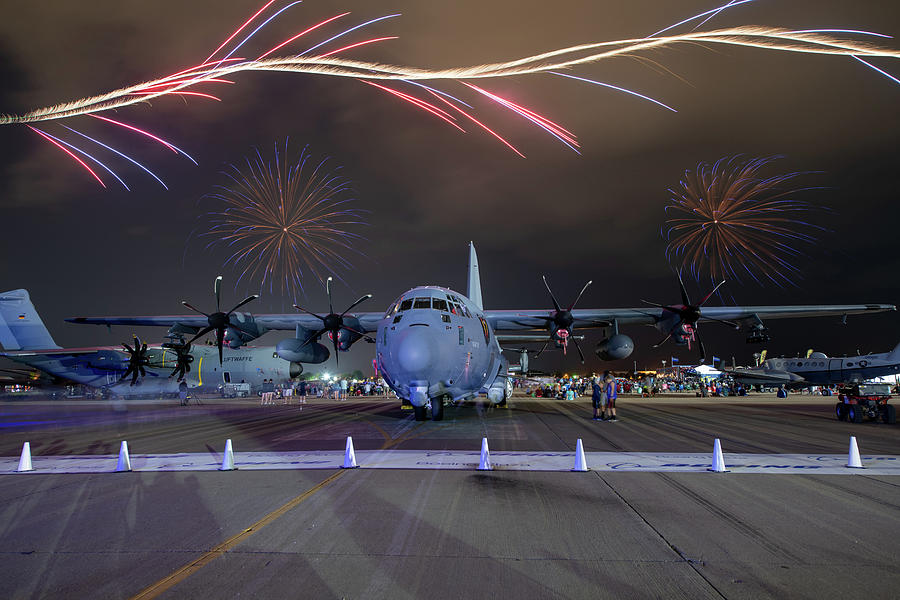 Airplane Photograph - C130 with fireworks #1 by Keith Homan