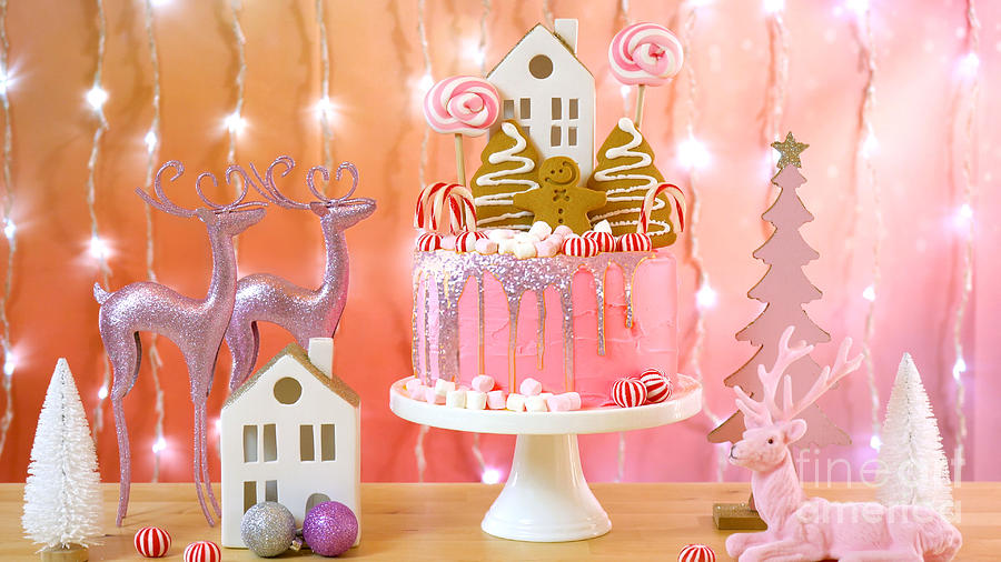Candy land Christmas cake in pink and gold party table setting. Photograph by Milleflore Images